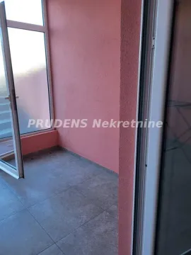 Unfurnished terrace with tiled floor and balcony doors. - image 9