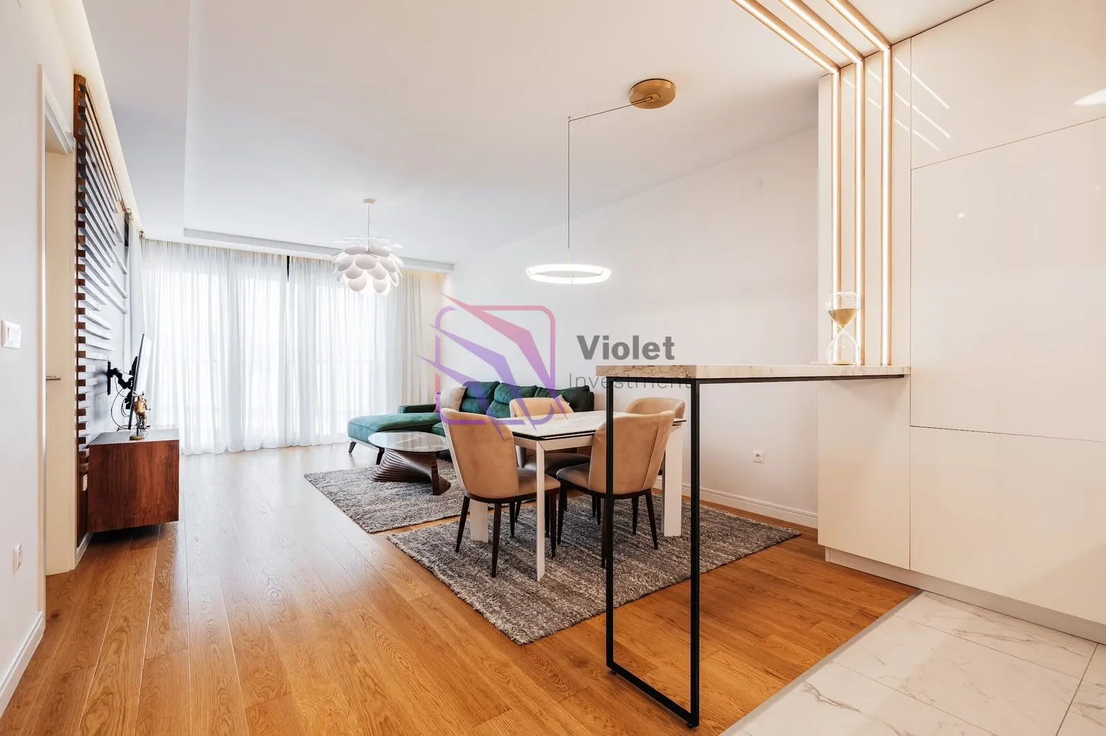 Living room with dining area and modern furniture.