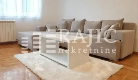 Comfortable living room with a corner sofa and white coffee table. - image 4