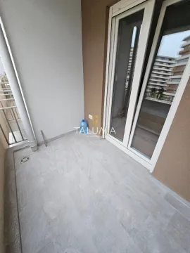 Unfurnished balcony with tiled flooring and balcony doors. - image 10