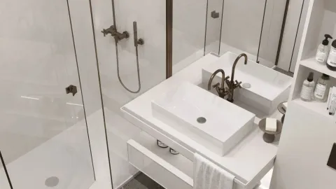 Moderne bijele umivaonike i tuš kabina u kupatilu. - image 4