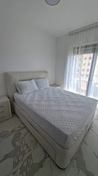 Bright bedroom with a double bed and access to the terrace. - image 4