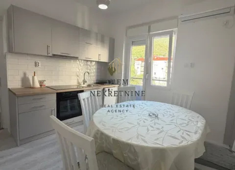 Modern kitchen with dining table and chairs. - image 5