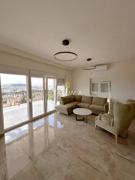 Spacious living room with a sofa set and access to the terrace. - image 4