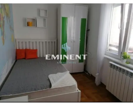 Furnished bedroom with a double bed, wardrobe, and a window. - image 7