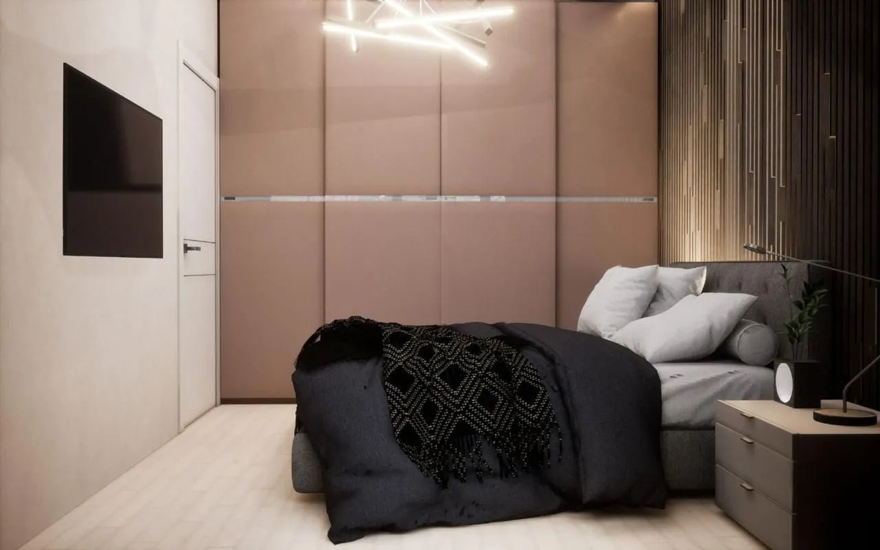 Modern bedroom with a double bed, large wardrobe, and wall-mounted television.