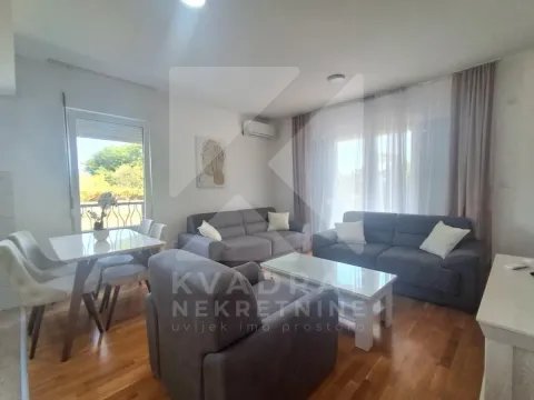 Living room with sofa set, dining table and access to the terrace. - image 2