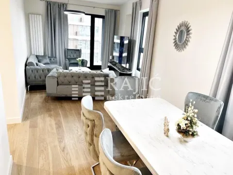 Living room with dining area and seating furniture. - image 2