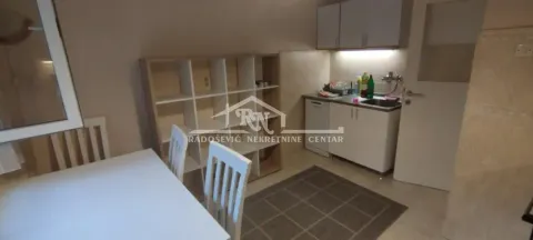 Smaller kitchen connected with the dining area. - image 5