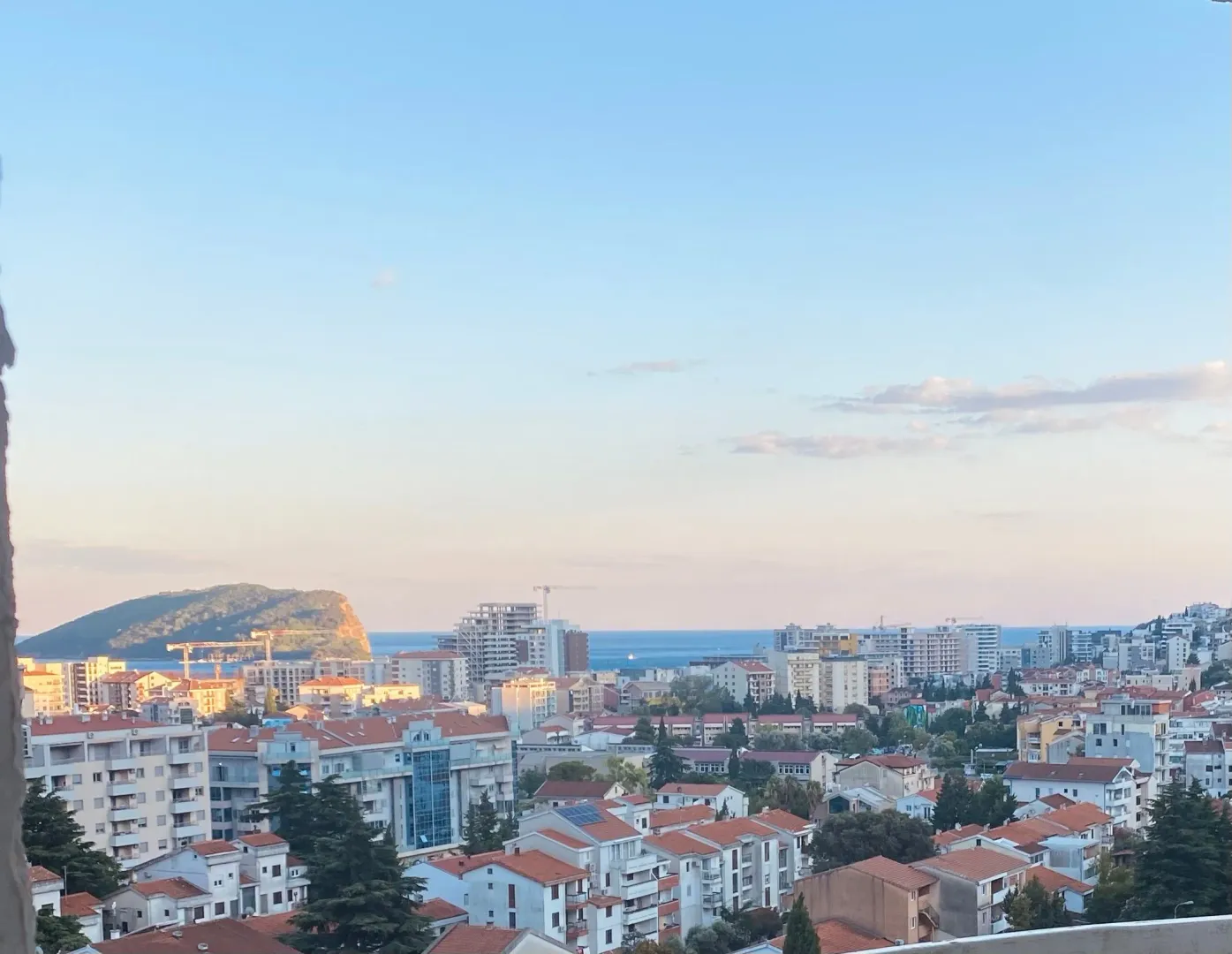 View of the city and the sea from the property terrace.