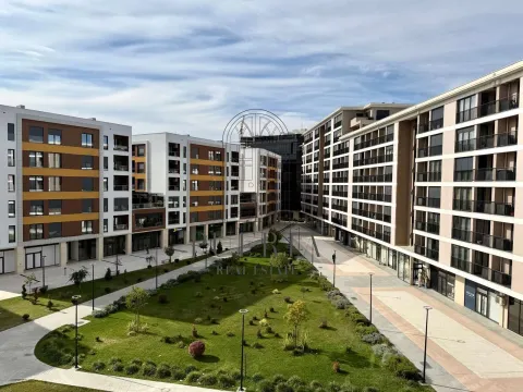 View from the terrace facing the courtyard and residential building facade. - image 7