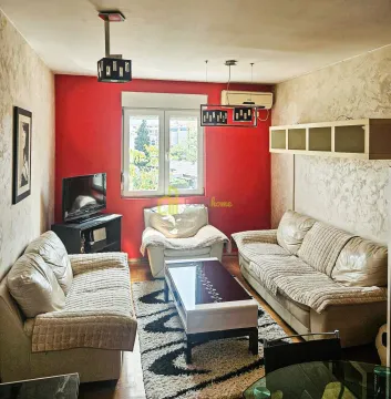 Living room with sofa set, coffee table and TV. - image 6