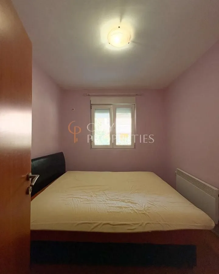 Smaller bedroom with a double bed and a window.