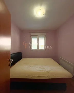 Smaller bedroom with a double bed and a window. - image 6