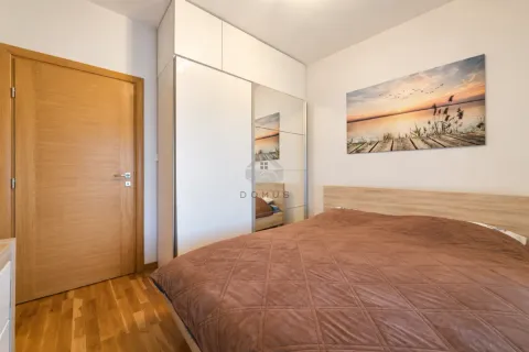 Bedroom with a double bed, large wardrobe and a picture on the wall. - image 16