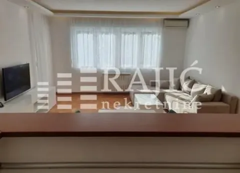 Living room with sofa and TV. - image 6