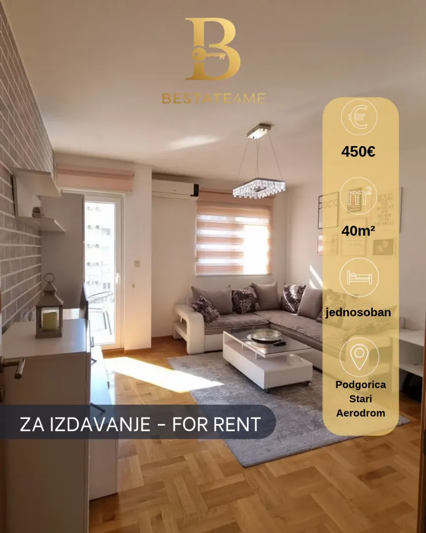 Living room with a sofa and access to the terrace.