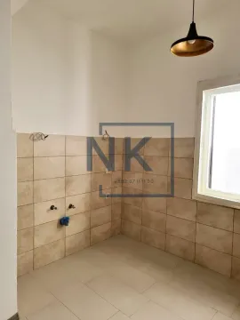 Unfurnished space intended for a kitchen with wall tiles. - image 9