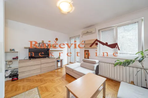 Living room with sofa, TV unit and parquet flooring. - image 18