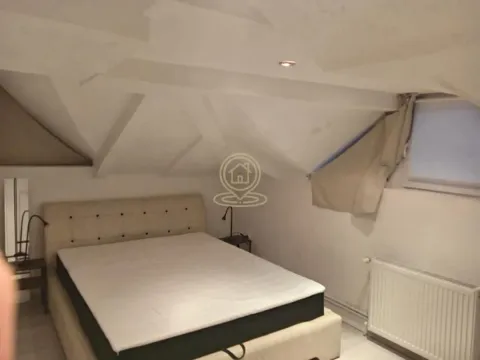 Attic bedroom with a double bed. - image 6