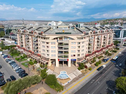 Aerial view of the exterior of the residential building and surroundings. - image 20