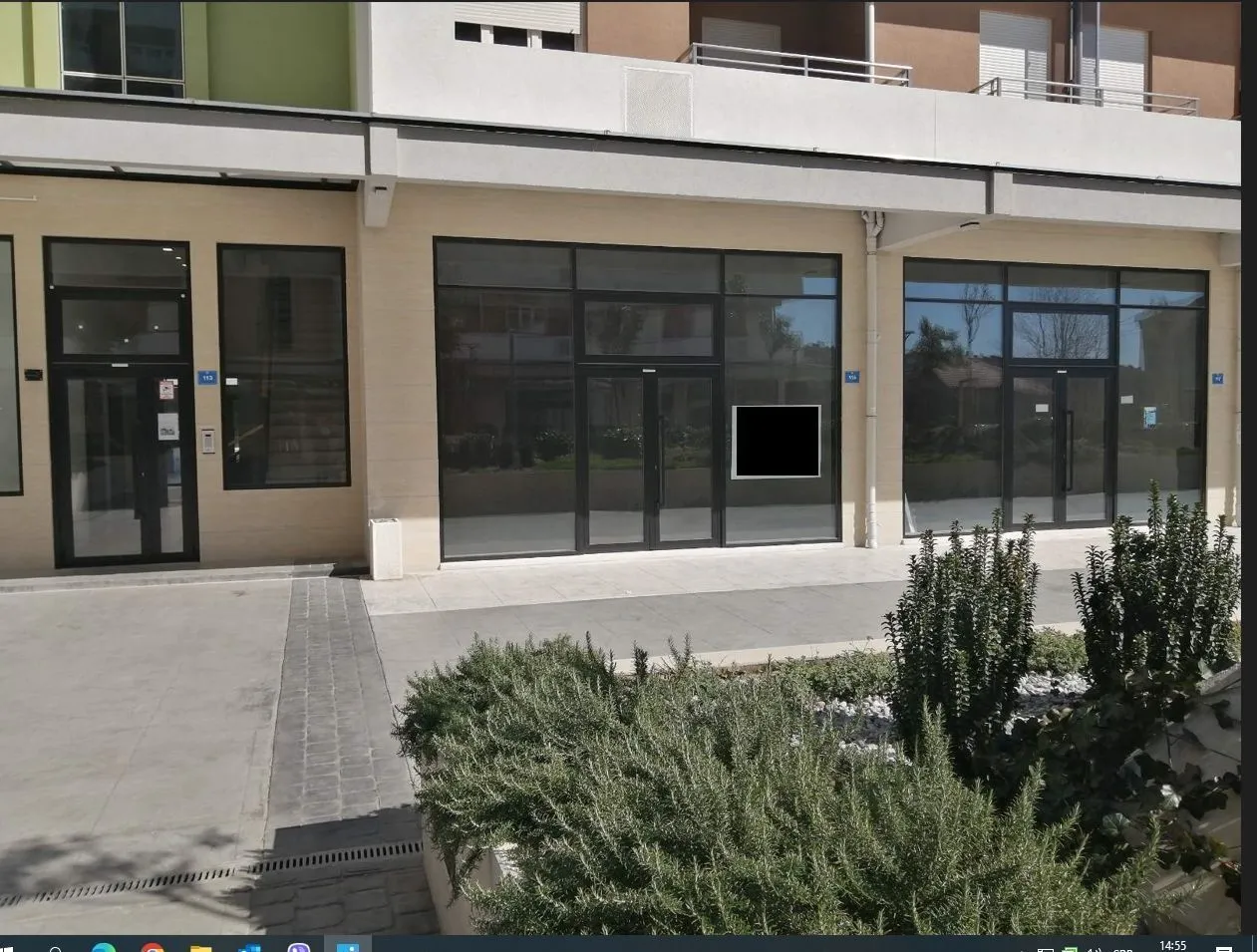 Modern commercial space on the ground floor of a newer building.