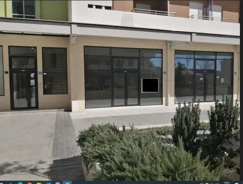 Modern commercial space on the ground floor of a newer building. - image 3