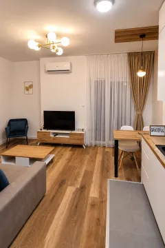 Dnevna soba povezana sa trpezarijom i kuhinjom. - image 3