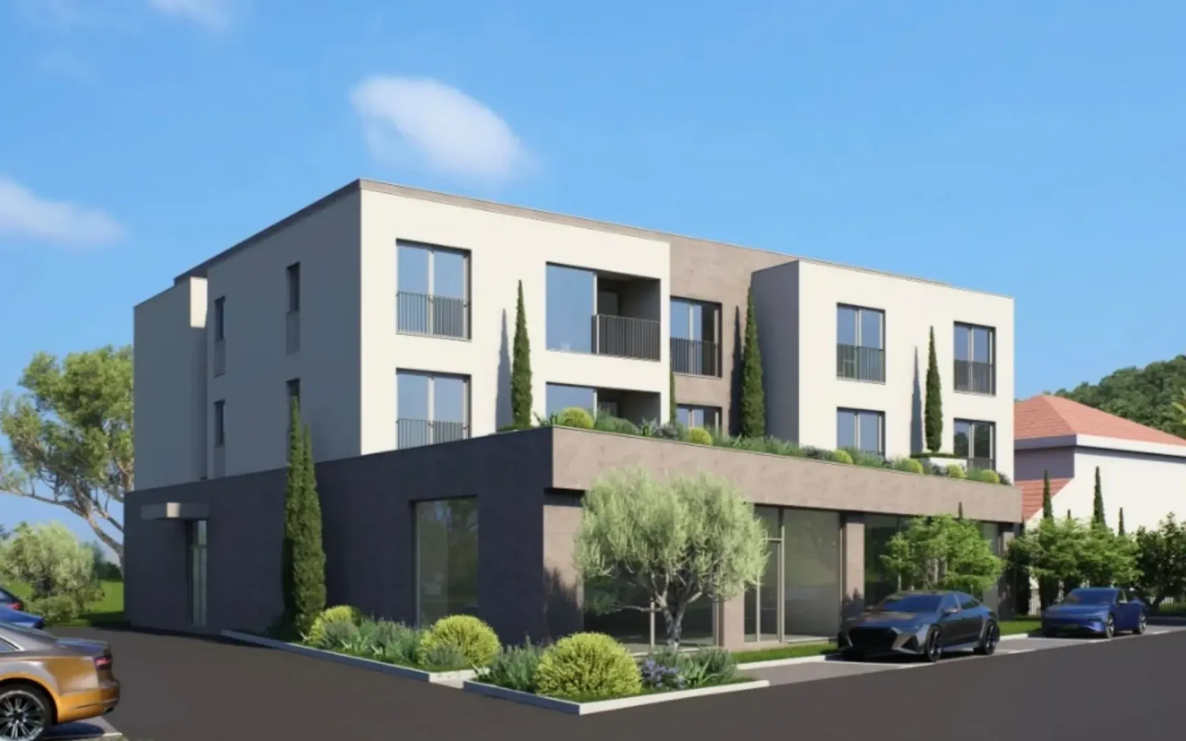 Exterior of a modern residential building with landscaped yard and parking.