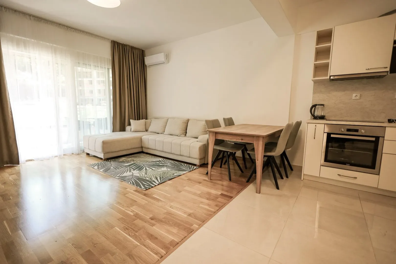 Spacious living room connected to the dining area and kitchen.