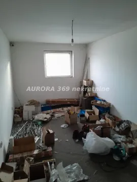 Empty room filled with boxes and construction materials. - image 10