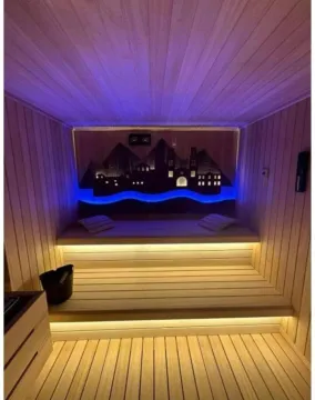 Modern wooden sauna with lighting and a decorative wall panel. - image 16