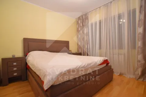 Furnished bedroom with a double bed and a nightstand. - image 7