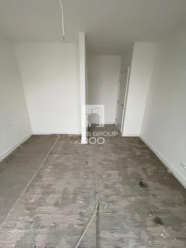 Empty unfinished room with white walls and a floor prepared for installation of flooring. - image 15