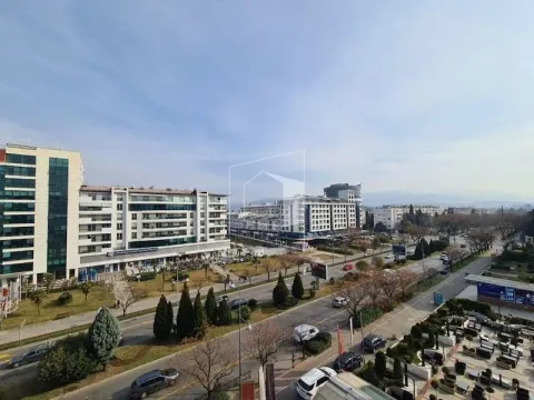 View of the city and surrounding streets from the property's terrace. - image 8