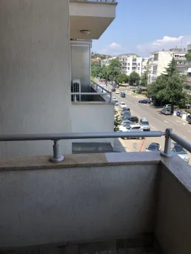 View from the terrace overlooking the street and surrounding buildings. - image 22