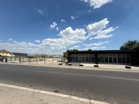 View of the commercial building and plot from the street. - image 2