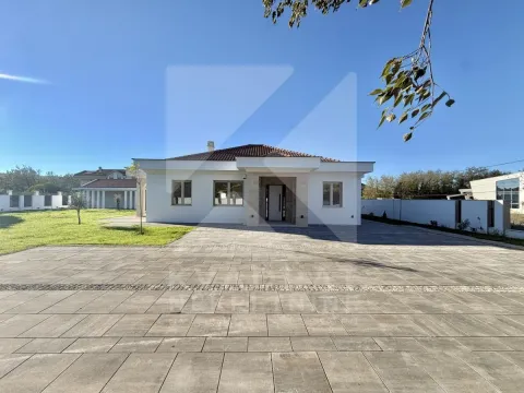 Front view of the house with a paved yard and lawn. - image 14