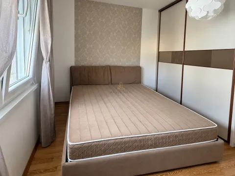 Furnished bedroom with a double bed and a fitted wardrobe. - image 10