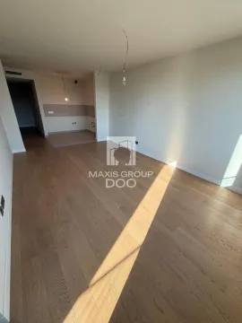 Empty room with wooden flooring and light entering through the window. - image 3