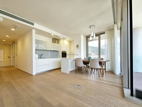 Modern bright living room with dining area and built-in kitchen. - image 3