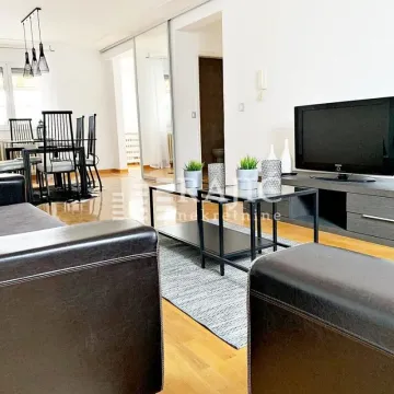 Spacious and bright living room with a dining area and seating set. - image 6