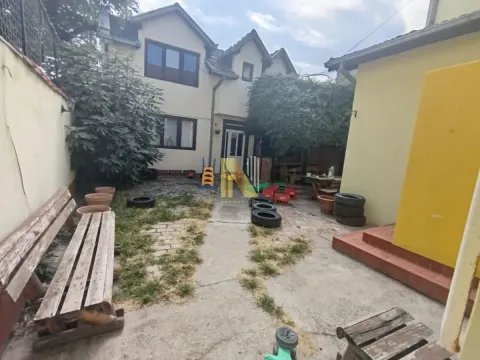 Family house yard with paved pathways and greenery. - image 19