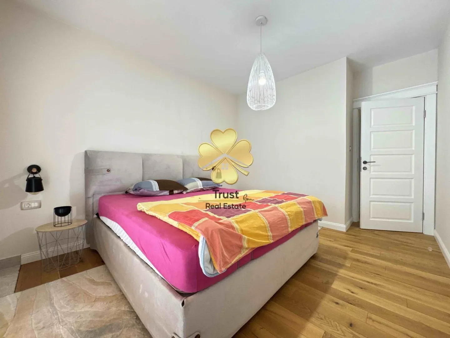 Furnished bedroom with a double bed.