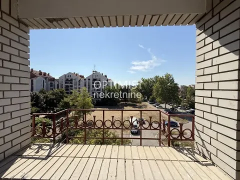 View from the balcony overlooking the neighborhood and greenery. - image 15