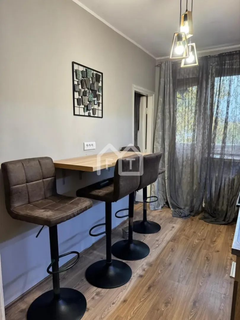 Dining bar with bar stools in the kitchen.
