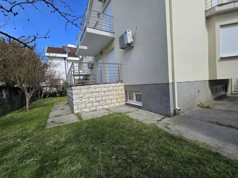 Exterior of the house with a yard and terrace. - image 45