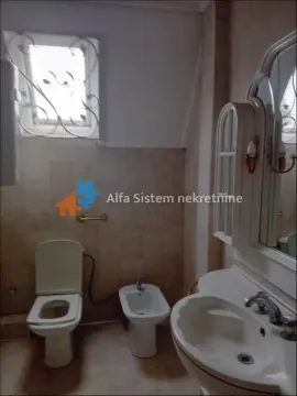 Bathroom equipped with sanitary fixtures and a mirrored cabinet. - image 9
