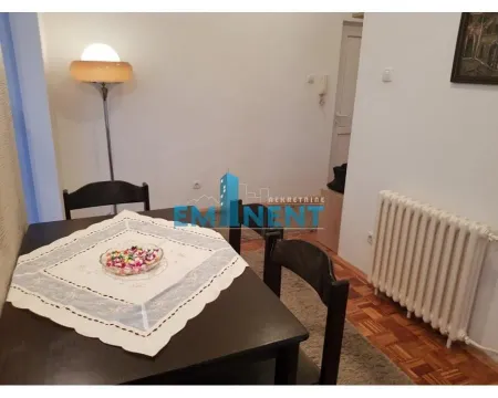 Dining area with a table, chairs, and a floor lamp. - image 5