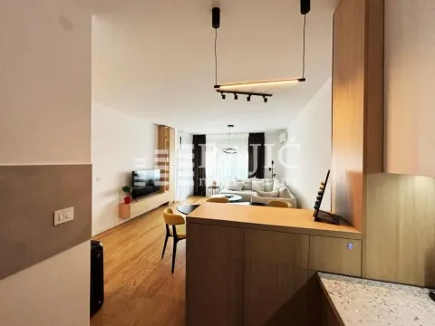 Modern living room connected to the dining area and kitchen. - image 8